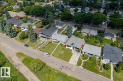 Residential neighborhood featuring mature trees and established properties - 
