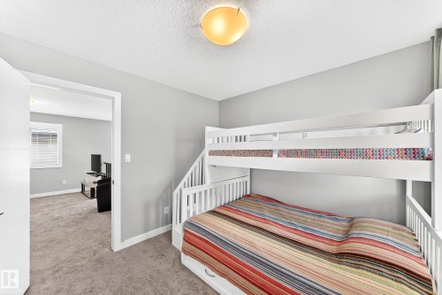 Room featuring neutral gray wall paint and light-colored carpet - 3672 Claxton Place, Edmonton, AB 