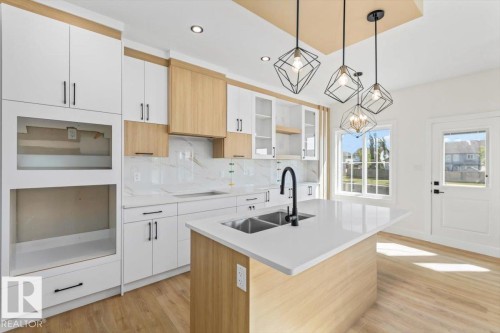 141 Elliott Wynd, Fort Saskatchewan, AB - Indoor Photo Showing Kitchen With Double Sink With Upgraded Kitchen