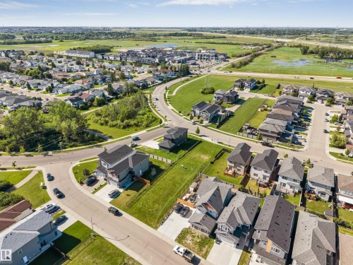 Aerial perspective highlighting a residential development with varied housing styles - 5512 150 Avenue, Edmonton, AB 