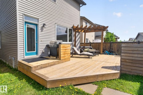 Expansive wood deck with a built-in pergola and privacy fencing - 3456 Cutler Crescent, Edmonton, AB - Outdoor With Deck Patio Veranda With Exterior