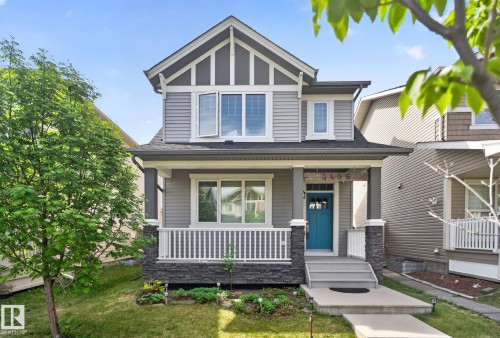 Craftsman-style home featuring gray siding with white trim accents - 3456 Cutler Crescent, Edmonton, AB - Outdoor With Deck Patio Veranda With Facade
