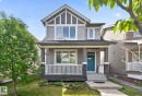 Craftsman-style home featuring gray siding with white trim accents - 3456 Cutler Crescent, Edmonton, AB  - Outdoor With Deck Patio Veranda With Facade 
