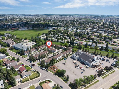 Aerial perspective showcasing a residential community with abundant green spaces - 24 1651 46 Street, Edmonton, AB 