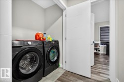 Dedicated laundry area featuring a washer and dryer - 