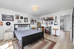 Bright interior space featuring light wood-finish flooring - 