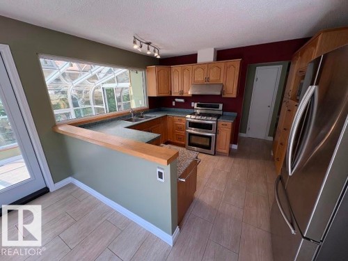 18 Flint Crescent, St. Albert, AB - Indoor Photo Showing Kitchen With Double Sink