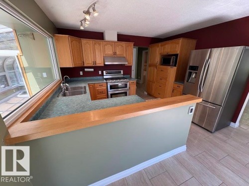 18 Flint Crescent, St. Albert, AB - Indoor Photo Showing Kitchen With Stainless Steel Kitchen With Double Sink