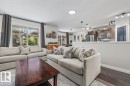 Open-concept living area with dark wood-finish flooring - 14 Edinburgh Crt N, St. Albert, AB 