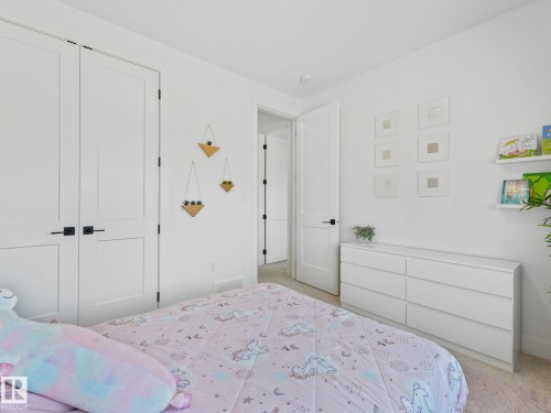 White interior doors with matte black hardware - 5411 66 Street, Beaumont, AB 