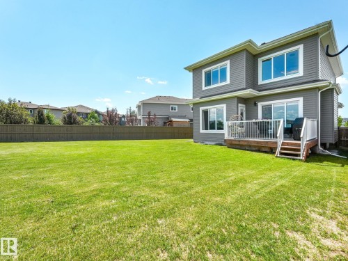 Spacious rear yard with a wooden privacy fence - 5411 66 Street, Beaumont, AB 