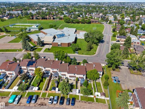 Terraced townhomes with individual backyards and mature trees - 14121 23 Street, Edmonton, AB 