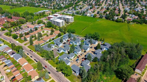Aerial perspective showcasing a residential development with multiple detached and attached structures - 10 1415 62 Street, Edmonton, AB 