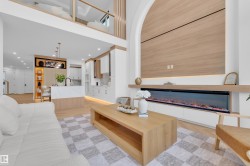 Open-concept living area featuring high ceilings and wood-finish flooring - 