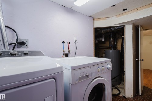 Dedicated laundry area featuring hookups for a washer and dryer - 212 Homestead Crescent, Edmonton, AB 