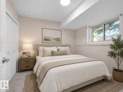 Spacious room featuring carpeted flooring, a large window, and light-toned walls - 