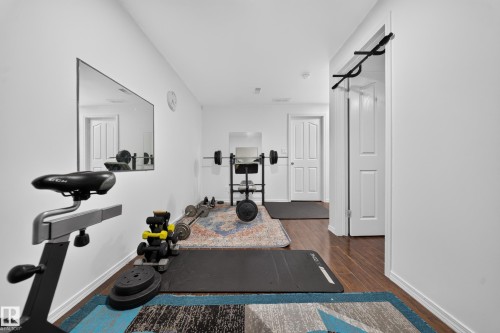Versatile bonus room with wood-finish flooring - 4 4350 23 Street, Edmonton, AB 