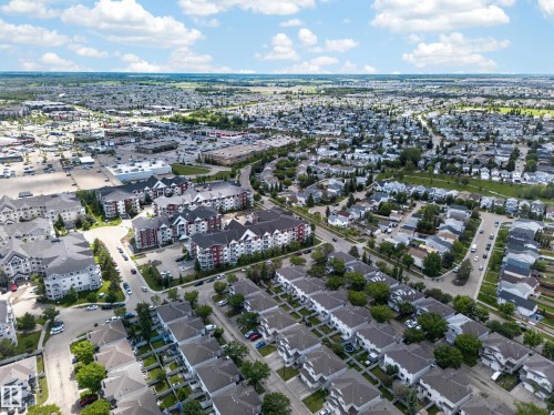 Expansive aerial perspective showcasing a developed suburban area - 4 4350 23 Street, Edmonton, AB 