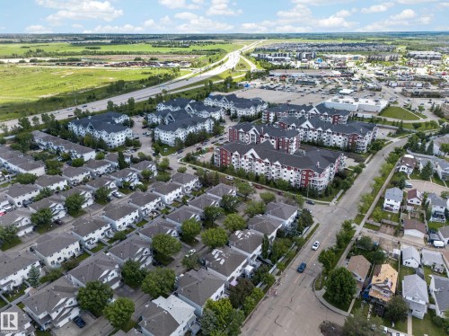 Residential development featuring a mix of townhomes and multi-story apartment buildings - 4 4350 23 Street, Edmonton, AB 