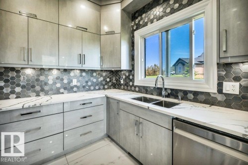 #50 50532 Range Road 234, Rural Leduc County, AB - Indoor Photo Showing Kitchen With Double Sink With Upgraded Kitchen