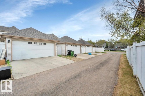 The double garage has access from the back alley - 4865 Terwillegar Common, Edmonton, AB - Outdoor