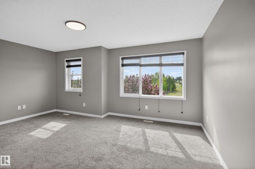 11 1140 Chappelle Boulevard, Edmonton, AB - Indoor Photo Showing Other Room