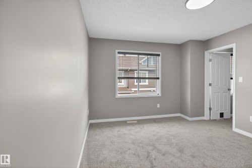 11 1140 Chappelle Boulevard, Edmonton, AB - Indoor Photo Showing Other Room