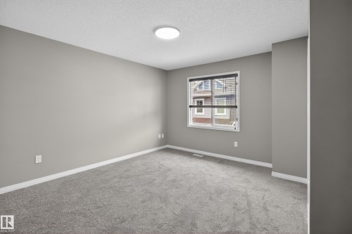 11 1140 Chappelle Boulevard, Edmonton, AB - Indoor Photo Showing Other Room