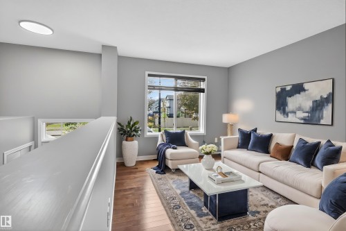 11 1140 Chappelle Boulevard, Edmonton, AB - Indoor Photo Showing Living Room