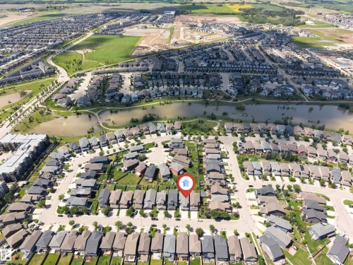 Aerial perspective showcasing a residential community with varied architectural styles - 8516 216 Street, Edmonton, AB 