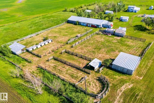 Agricultural property featuring multiple fenced pastures, a large barn, and several outbuildings - 551027 Range Road 193, Rural Lamont County, AB 
