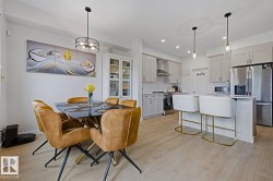 Open-concept layout featuring light wood-finish flooring - 