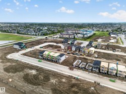 Developing residential area featuring a mix of completed homes and new construction - 