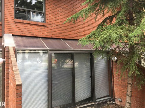 Exterior space featuring brick siding - 11176 83 Avenue, Edmonton, AB - Outdoor With Exterior