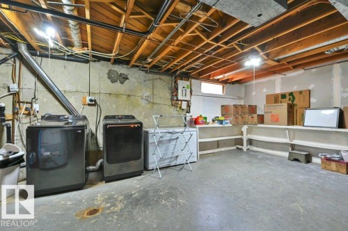 Utility area showing a new washer and dryer - 16211 78 Avenue, Edmonton, AB 