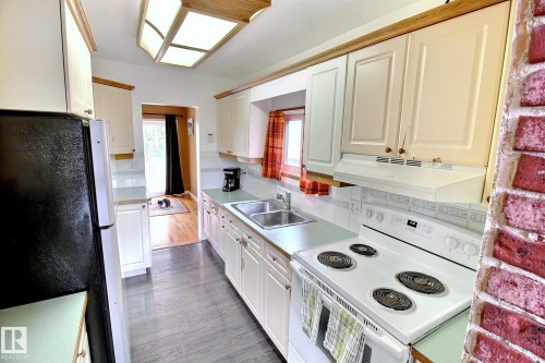 11930 95A Street, Edmonton, AB - Indoor Photo Showing Kitchen With Double Sink