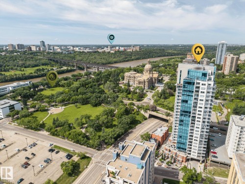 Contemporary high-rise building featuring extensive glass curtain walls and numerous balconies - 802 9720 106 Street, Edmonton, AB 