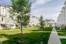 Expansive green space featuring a manicured lawn, established trees, and a concrete pathway - #55 723 172 St Sw, Edmonton, AB  - Outdoor 