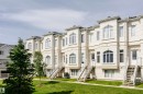 Row of multi-story townhomes featuring light-toned exteriors with decorative architectural accents - #55 723 172 St Sw, Edmonton, AB  - Outdoor With Facade 