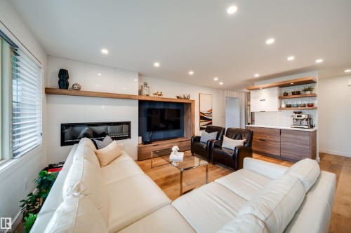 5431 113A Street, Edmonton, AB - Indoor Photo Showing Living Room With Fireplace