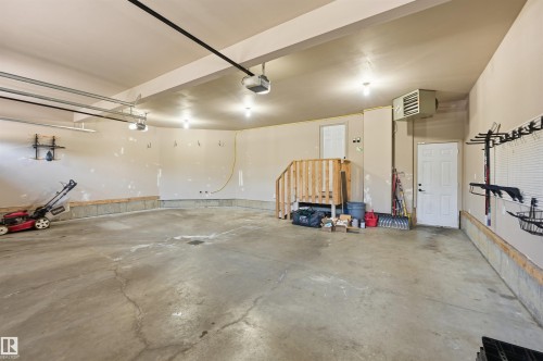 Oversized heated garage approx 31x25 - 5216 Mullen Crest, Edmonton, AB 