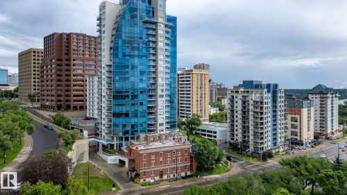 Modern high-rise with blue glass facade and multiple balconies - 1504 9720 106 Street, Edmonton, AB 