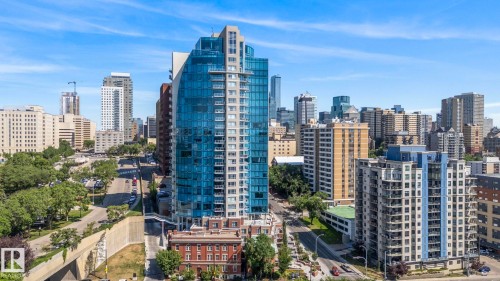 Modern high-rise with a blue glass facade - 1504 9720 106 Street, Edmonton, AB 