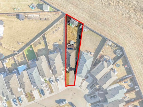 Aerial Site Plan. Outlining the property boundaries and surrounding structures - 17171 38 Street, Edmonton, AB 