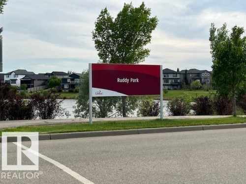 Waterfront properties featuring established landscaping and mature trees - 138 Reed Place, Leduc, AB 