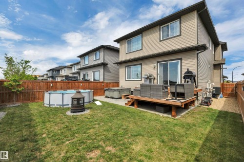 548 Reynalds Wynd, Leduc, AB - Outdoor With Above Ground Pool With Deck Patio Veranda