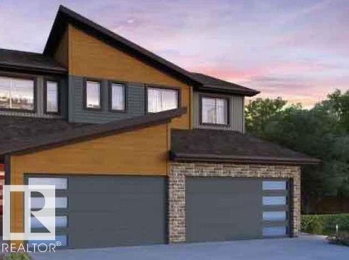 Contemporary facade featuring varied siding materials and a multi-level roofline - 2627 62 Street, Edmonton, AB 