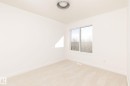 Neutral toned walls and carpeting establish a versatile foundation for personalization - 2627 62 Street, Edmonton, AB 