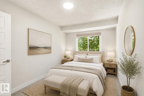 Recessed window with exterior foliage, ceiling-mounted light fixture, light-toned walls, and a flat-panel door - 18217 84 Avenue Nw, Edmonton, AB 
