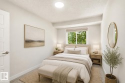 Recessed window with exterior foliage, ceiling-mounted light fixture, light-toned walls, and a flat-panel door - 